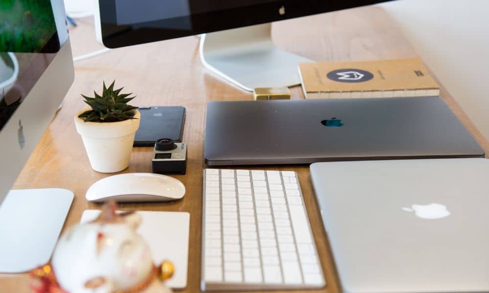 Minimalist workspace with Apple devices.