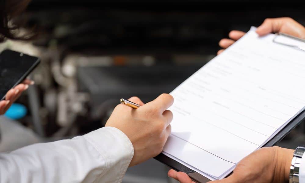 Filling out an insurance report form