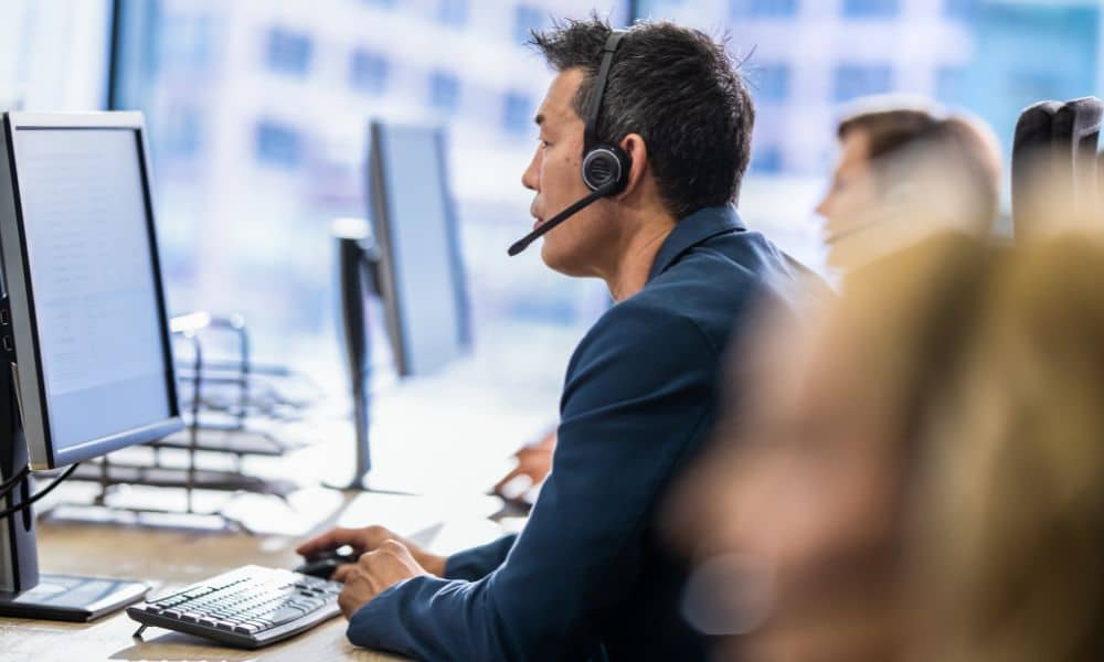 Person using headset at computer